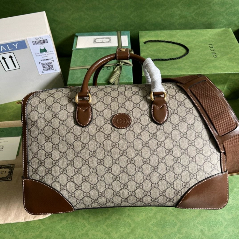 G*u*i top handle bags